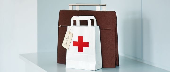 Work bag and paper bag with red cross and note "for grandpa" Work bag and paper bag with red cross and note "for grandpa"
